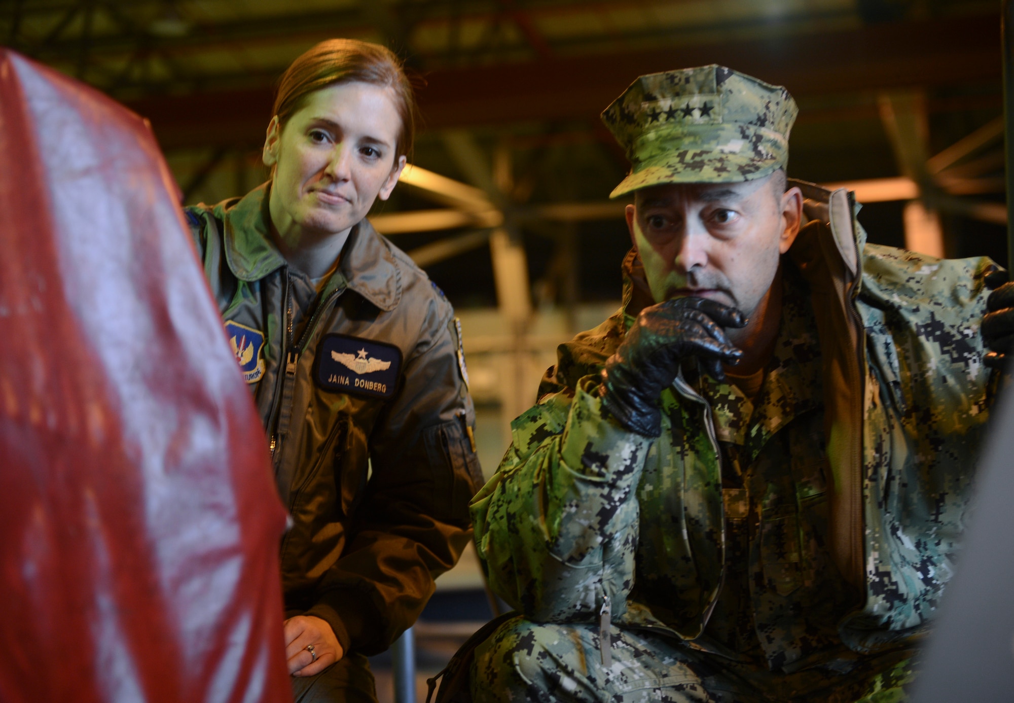 ROYAL AIR FORCE LAKENHEATH, England - Capt. Jaina Donberg (left), 492nd Fighter Squadron pilot and native of Arlington, Va., briefs U.S. Navy Adm. James G. Stavridis (right), U.S. European Command commander and NATO Supreme Allied Commander Europe, on the capabilities of an F-15E Strike Eagle Feb. 12, 2013. The admiral toured RAFs Mildenhall and Lakenheath to visit U.S. and NATO assets assigned in the U.K. (U.S. Air Force photo by Staff Sgt. Stephen Linch)