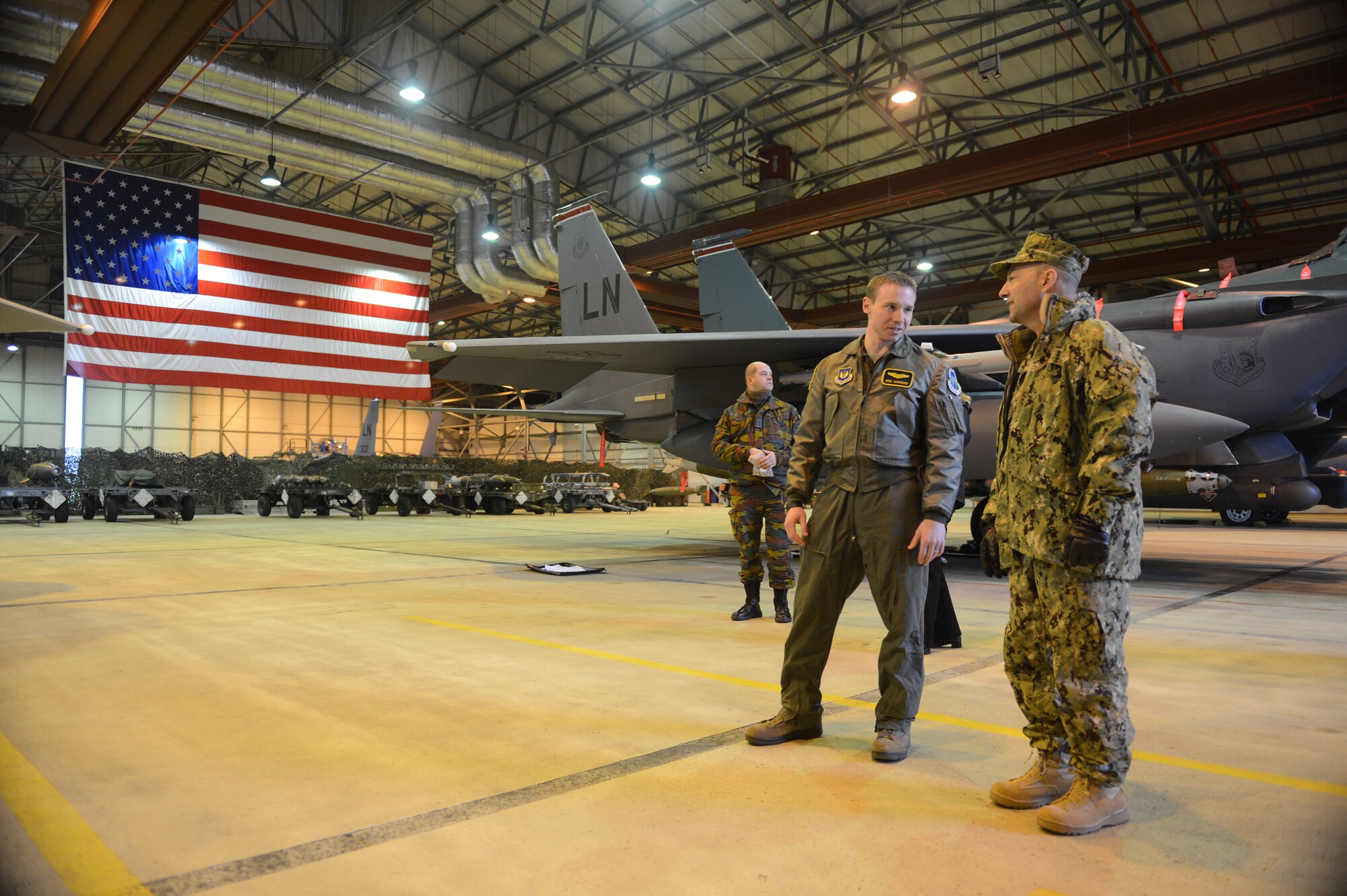 ROYAL AIR FORCE LAKENHEATH, England - Capt. Greg Schroeder (left), 493rd Fighter Squadron pilot and native of Dayton, Ohio, speaks with U.S. Navy Adm. James G. Stavridis (right), U.S. European Command commander and NATO Supreme Allied Commander Europe, about the capabilities of an F-15C Eagle Feb. 12, 2013. The admiral toured RAFs Mildenhall and Lakenheath to visit U.S. and NATO assets assigned in the U.K. (U.S. Air Force photo by Staff Sgt. Stephen Linch)