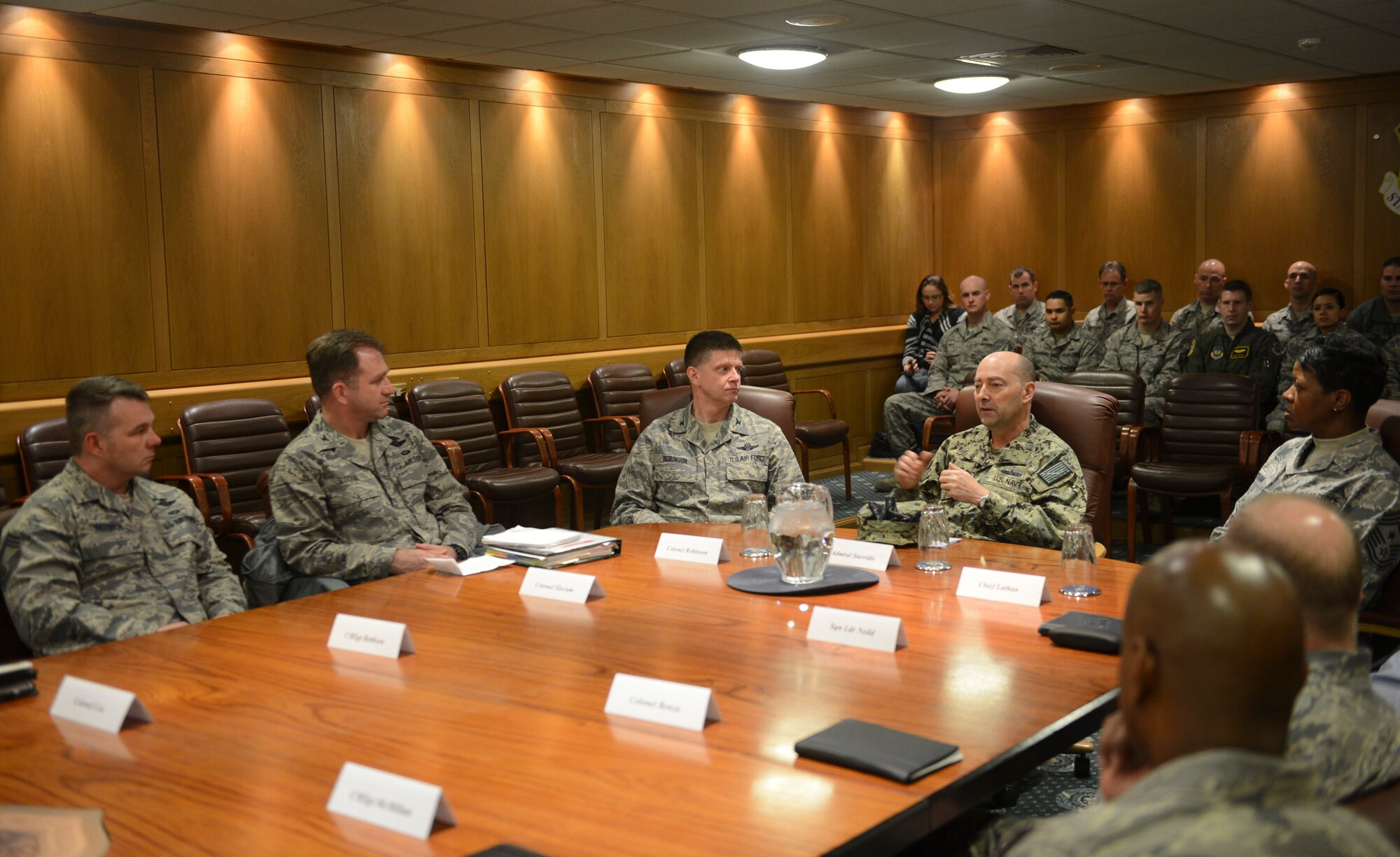 ROYAL AIR FORCE LAKENHEATH, England - U.S. Navy Adm. James G. Stavridis (center right), U.S. European Command commander and NATO Supreme Allied Commander Europe, talks to members of the 48th Fighter Wing, Feb. 12, 2013. The admiral toured RAFs Mildenhall and Lakenheath to visit U.S. and NATO assets assigned in the U.K. (U.S. Air Force photo by Staff Sgt. Stephen Linch)