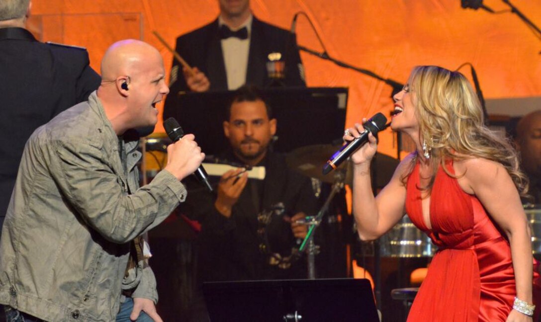 MSgt Ryan Carson sings with Melina León (photo by SMSgt Robert Kamholz)
 
