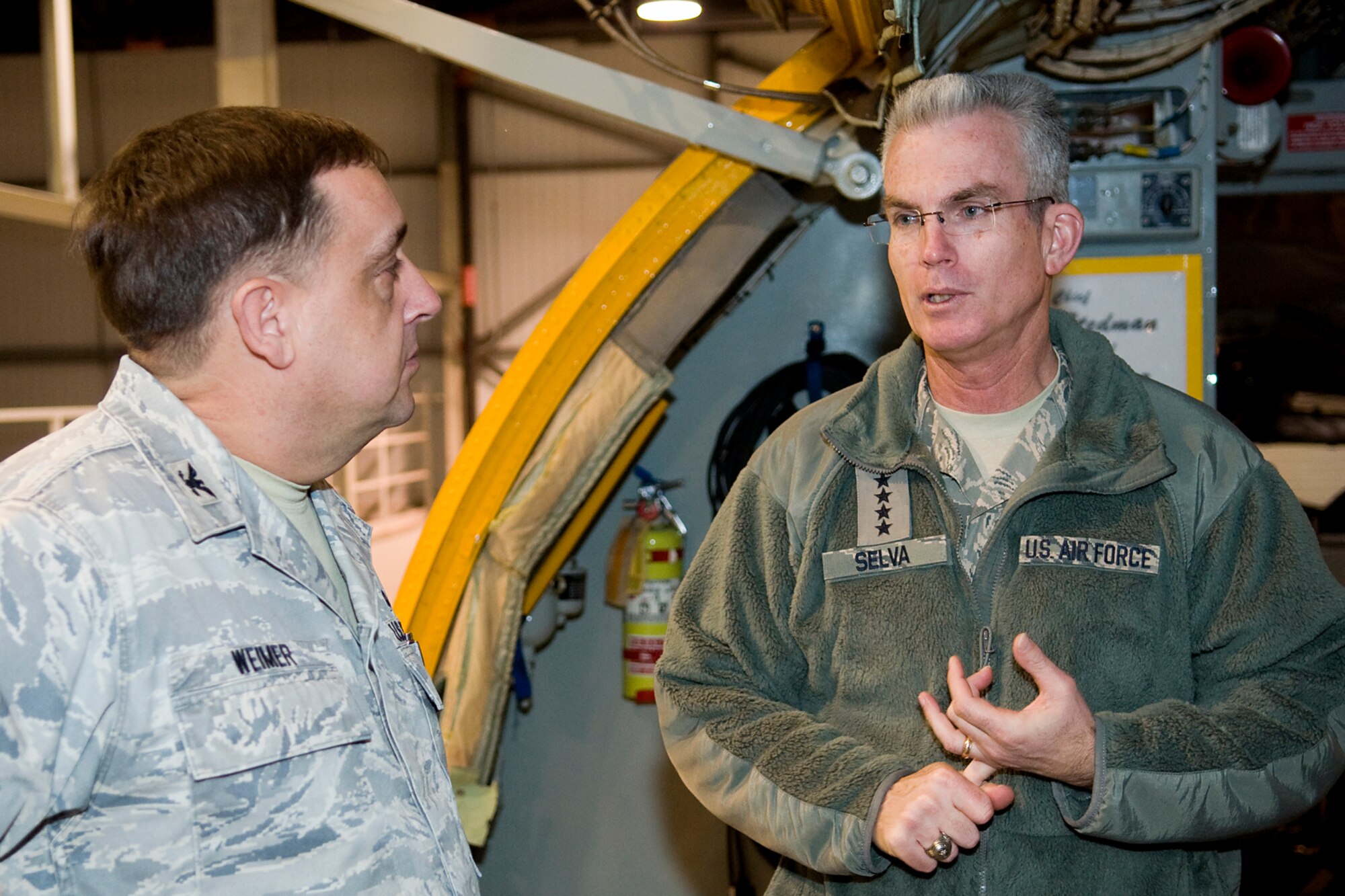GRISSOM AIR RESERVE BASE, Ind. -- Gen. Paul Selva, Air Mobility Command commander, talks with Col. Paul Weimer, 434th Maintenance Group Commander, during his visit to the Hoosier base Feb. 5. Selva visited Grissom during a tour of AMC gained Air Force Reserve and Air National Guard units. (U.S. Air Force photo/Tech. Sgt. Mark R. W. Orders-Woempner)
