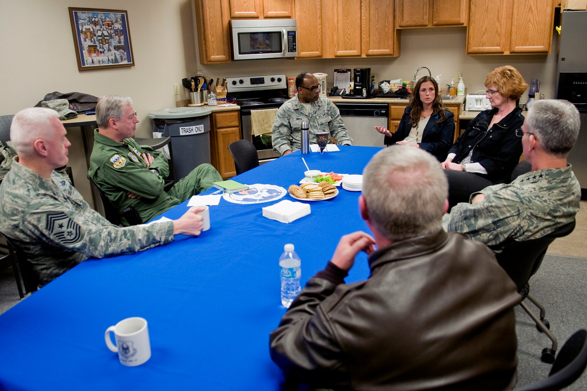 GRISSOM AIR RESERVE BASE, Ind. -- Alison Duncan, 434th Air Refueling Wing sexual assault response coordinator, talks with Gen. Paul Selva, Air Mobility Command commander, about the support programs available to Airmen and their families at Grissom during the general's visit Feb. 5. Also pictured from are Chief Master Sgt. Andy Kaiser, AMC command chief; Brig. Gen. Roy E. Uptegraff III, Air National Guard assistant to the AMC commander, Chaplain (Maj.) Obadiah Smith Jr., 434th ARW chaplain; Jill Marconi, Grissom Airman and Family Readiness Center director; and Col. Don Buckley, 434th ARW commander. (U.S. Air Force photo/Tech. Sgt. Mark R. W. Orders-Woempner)
