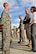 SOUTHWEST ASIA -- Air Force Chief of Staff Gen. Mark A. Welsh III and his wife, Betty, talk with Staff Sgt. Benjamin Vass, a 380th Expeditionary Aircraft Maintenance Squadron dedicated crew chief, and other members of the 380th EAMXS, Feb. 7, 2013. Cody and Air Force Chief of Staff Gen. Mark A. Welsh III visited the 380th Air Expeditionary Wing during a multi-base tour to meet with Airmen who are deployed throughout the U.S. Central Command area of responsibility. (U.S. Air Force photo/Tech. Sgt. Christina M. Styer)