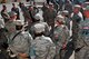 SOUTHWEST ASIA -- Air Force Chief of Staff Gen. Mark A. Welsh III and Chief Master Sgt. of the Air Force James Cody visit with Airmen from the 380th Expeditionary Security Forces Squadron Feb. 7, 2013. Welsh and Cody visited the 380th Air Expeditionary Wing during a multi-base tour to meet with Airmen who are deployed throughout the U.S. Central Command area of responsibility. (U.S. Air Force photo/Tech. Sgt. Christina M. Styer)