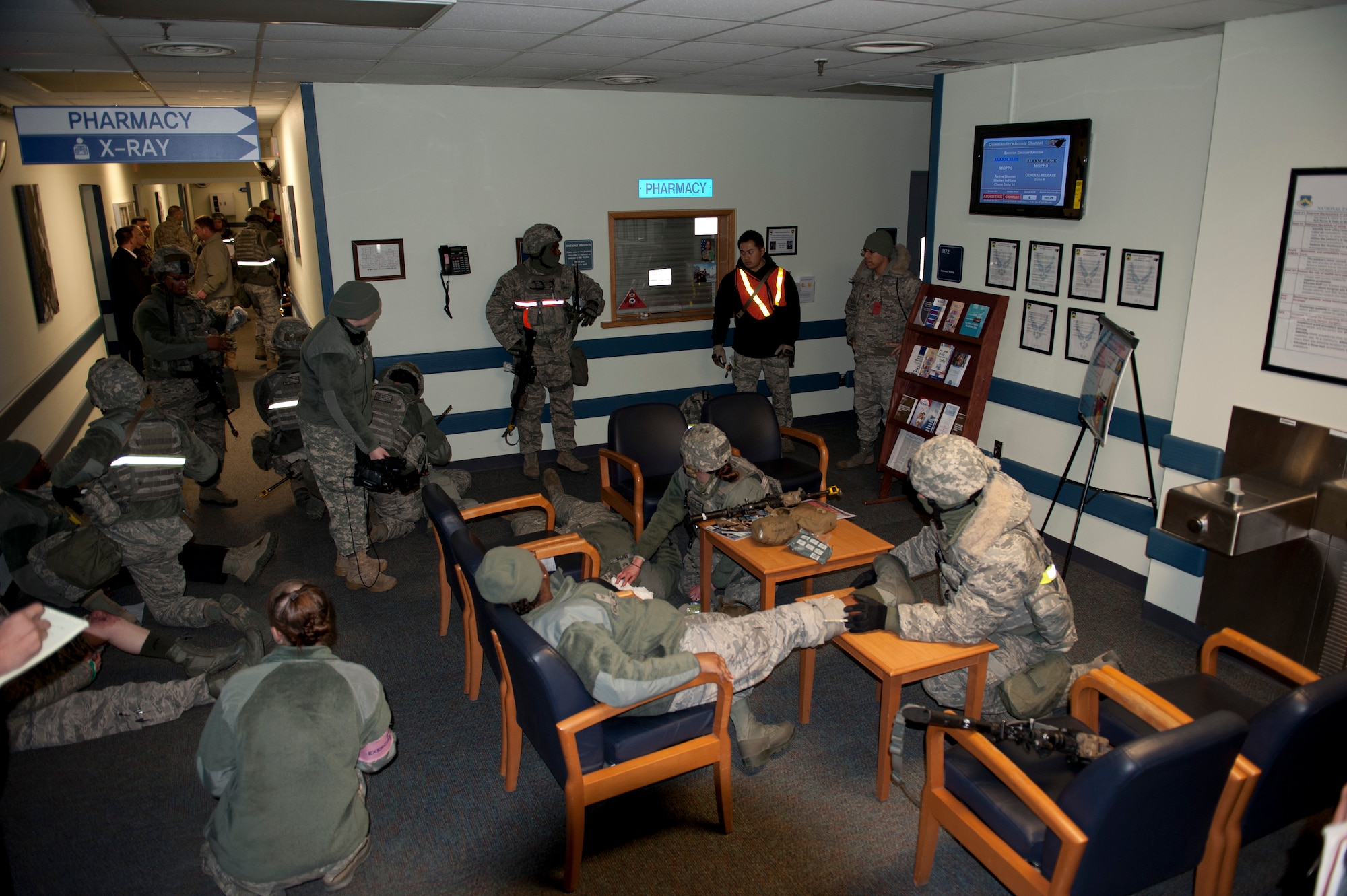 KUNSAN AIR BASE, Republic of Korea - Members of the 8th Medical Group Clinic expediently provided self-aid and buddy care to the wounded during an active shooter scenario at the 8th Medical Group Clinic at Kunsan Air Base, Republic of Korea, Feb. 12, 2013. Medical professionals gave care to the 10 wounded. (U.S. Air Force photo by Tech. Sgt Michael Schocker)

