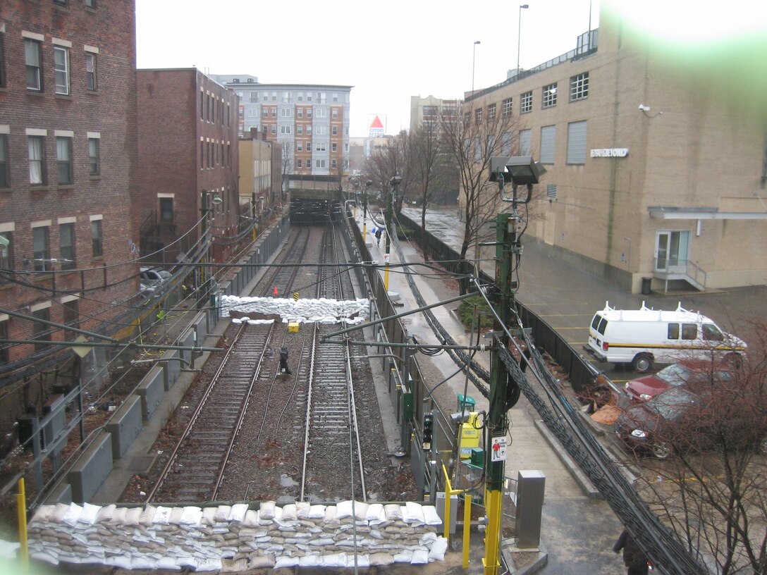 Sandbags are put across the Greenline tracks in Boston, Mass., as the Muddy River rises March 14, 2010. (U.S. Army Corps of Engineers photo)