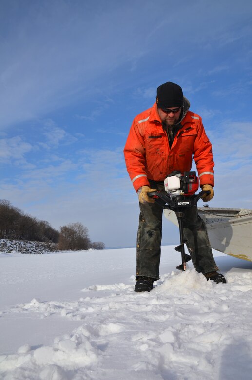 WABASHA, Minn. – Bill Chelmowski, U.S. Army Corps of Engineers, St. Paul District marine machinery mechanic, uses an ice auger to drill a hole on Lake Pepin, near Wabasha, Minn., Feb. 13, during the first Mississippi River ice surveys of the year. The district conducts the annual ice surveys to help the navigation industry determine when it is safe to break through the ice. Lake Pepin, located on the Mississippi River between Red Wing and Wabasha, Minn., is used as the benchmark because the ice melts slower in this area due to the lake width and the slower current.