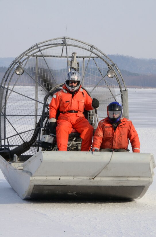 WABASHA, Minn. – U.S. Army Corps of Engineers, St. Paul District employees Al VanGuilder, left, survey technician, and Bill Chelmowski, marine machinery mechanic, use an airboat to  measure ice on Lake Pepin, near Wabasha, Minn., Feb. 13, during the first Mississippi River ice surveys of the year. The district conducts the annual ice surveys to help the navigation industry determine when it is safe to break through the ice. Lake Pepin, located on the Mississippi River between Red Wing and Wabasha, Minn., is used as the benchmark because the ice melts slower in this area due to the lake width and the slower current.