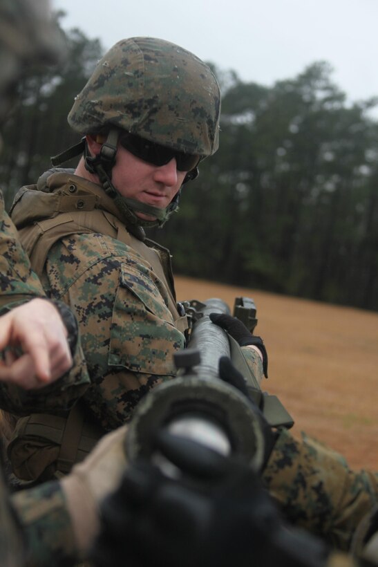Cpl. Corey Oncken, a gunner with 2nd LAAD, watches as a Stinger missile simulator is loaded for him to fire during the battalion team and section leaders course Feb. 8. Oncken was one of several Marines to fire the Stinger dummy round as a final test before graduating the course.