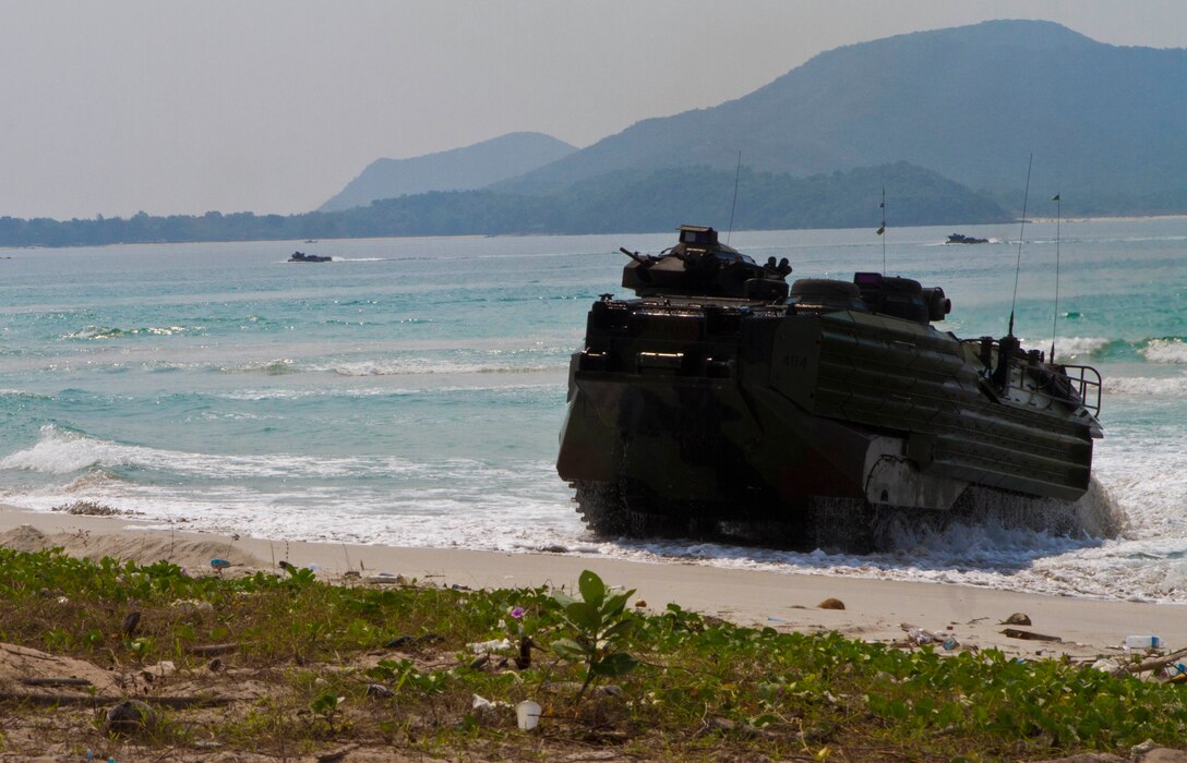 An amphibious assault vehicle from Company A., Battalion Landing Team 1st Battalion, 5th Marine Regiment, 31st Marine Expeditionary Unit, climbs on to a beach during an amphibious assault for exercise Cobra Gold 2013 here, Feb. 14. Cobra Gold is an annual exercise that includes numerous multilateral events ranging from amphibious assaults to non-combatant evacuation operations. The training aims to improve interoperability between the United States, the Kingdom of Thailand, and many other participating countries.  The 31st MEU is the only continuously forward-deployed MEU and is the Marine Corps’ force in readiness in the Asia-Pacific region.