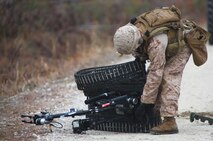 A Marine with 2nd Explosive Ordnance Disposal Company, 2nd Marine Logistics Group reattaches the treads to a robot used during the unit’s training exercise at Camp Davis, N.C., Feb. 12, 2013. A simulated improvised explosive device disabled the robot as part of training scenario designed to prepare the unit’s Marines to support ground operations in Afghanistan. 