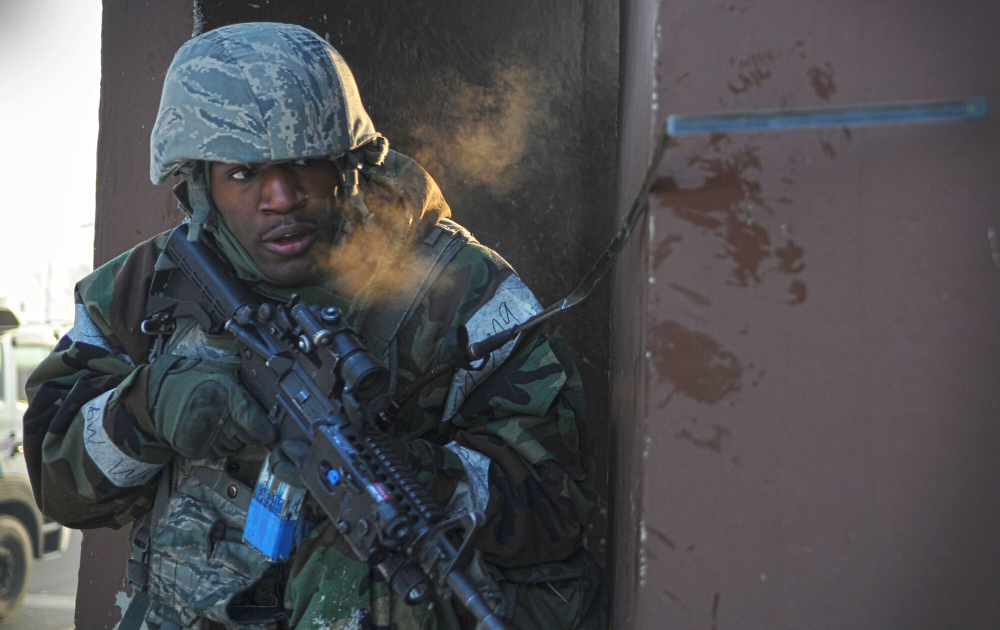 Senior Airman Eric Salazar, 51st Security Forces Squadron member, secures a bunker located at the wing headquarters building during the last counter surveillance scenario during operation readiness exercise Beverly Bulldog 13-02 at Osan Air Base, Republic of Korea, Feb. 15, 2013. Counter surveillance scenarios are conducted throughout the ORE in order to help security forces Airmen learn how to better secure the base and defend against opposing forces. (U.S. Air Force photo/Staff Sgt. Sara Csurilla)