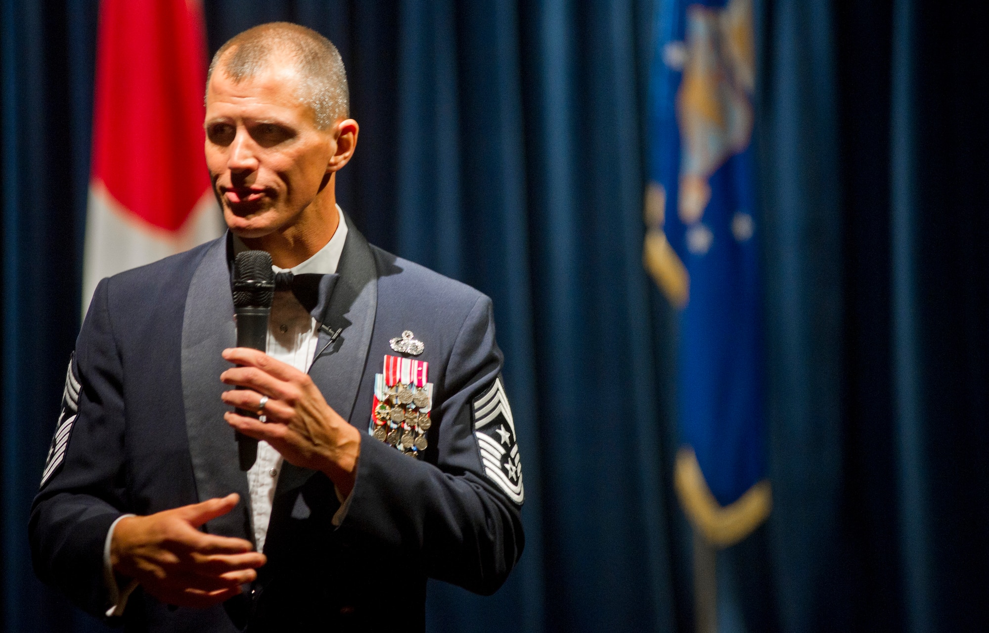 YOKOTA AIR BASE, Japan -- Command Chief Master Sergeant of Pacific Air Forces, Chief Master Sgt. Steve McDonald, addresses the audience at Yokota Air Base’s Chief Induction Ceremony, Feb. 8, 2013.  McDonald shared personal experieces with Yokota’s newest chiefs and expressed his expectations. (U.S. Air Force photo by Staff Sgt. Stacy Moless)