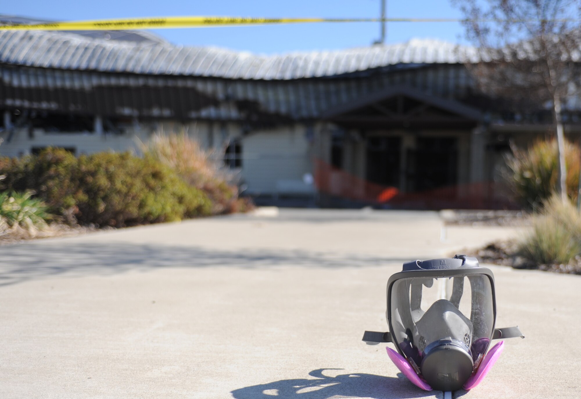 Respirator masks protect Airmen from inhaling airborne particulates that can cause harm to their lungs. Senior leaders from Beale Air Force Base wore masks while entering a building which was recently destroyed by a fire. (U.S. Air Force photo by Airman 1st Class Bobby Cummings/Released)