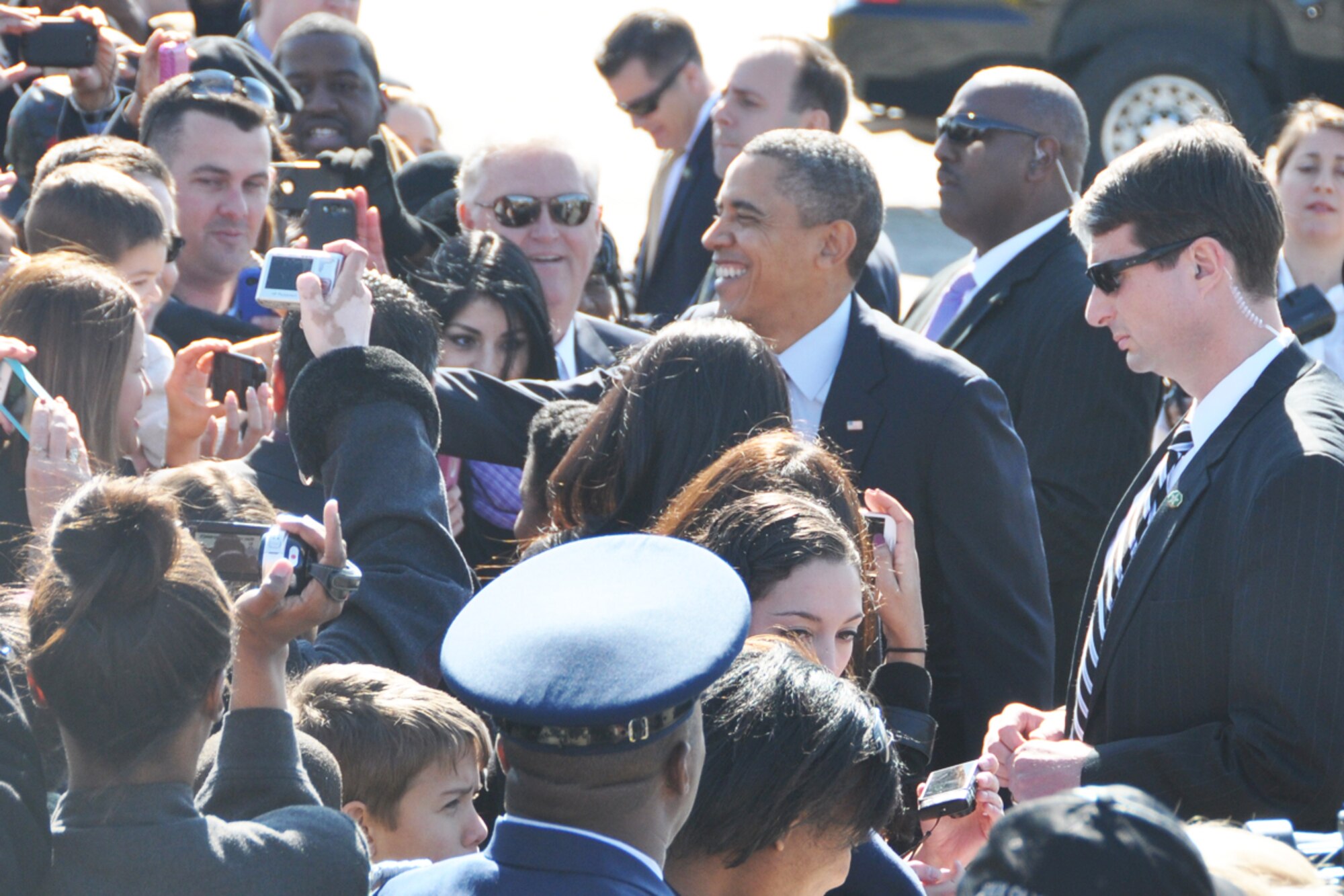 President Barack Obama greets guests during his visit to Dobbins Air Reserve Base, Feb. 14. The president was en-route to the City of Decatur Recreation Center to discuss proposals outlined in his recent state of the union address. (U.S. Air Force photo/James Branch)