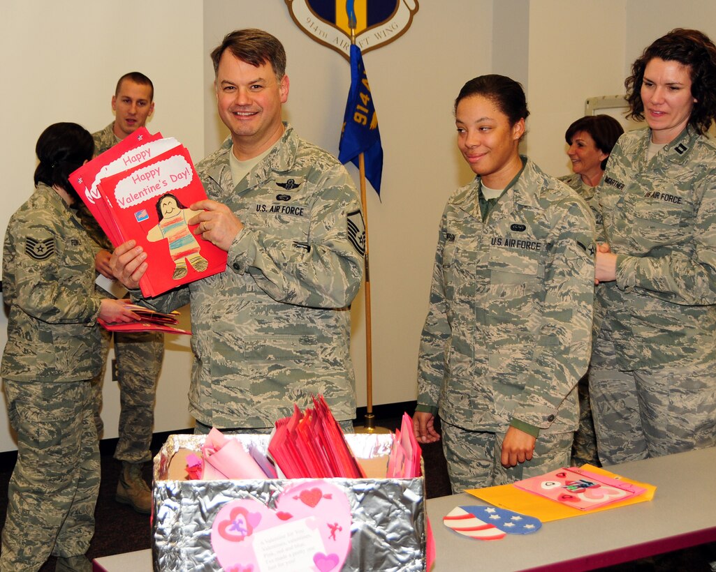 Edward A. Rath III, Erie County Legislator presented Valentine day cards to members of the 914th and 107th Airlift Wings during a presentation at the Niagara Falls Air Reserve Station on February 14, 2013. The cards were hand made by participating Western New York elementary school children. The "Valentines for Vets" Program is in its third year and has been distributed to local veterans and those overseas. (U.S. Air Force photo by Peter Borys)