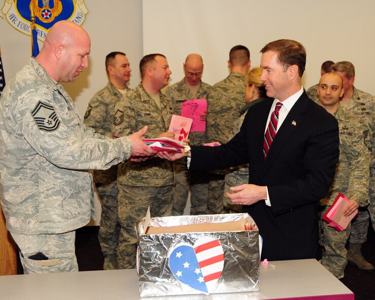Edward A. Rath III, Erie County Legislator, presents Valentines Day cards to members of the 914th and 107th Airlift Wings during a presentation at the Niagara Falls Air Reserve Station on February 14, 2013. The cards were hand-made by participating western New York elementary school children. The "Valentines for Vets" program is in its third year and has been distributing cards to local veterans and those overseas. (U.S. Air Force photo by Peter Borys)