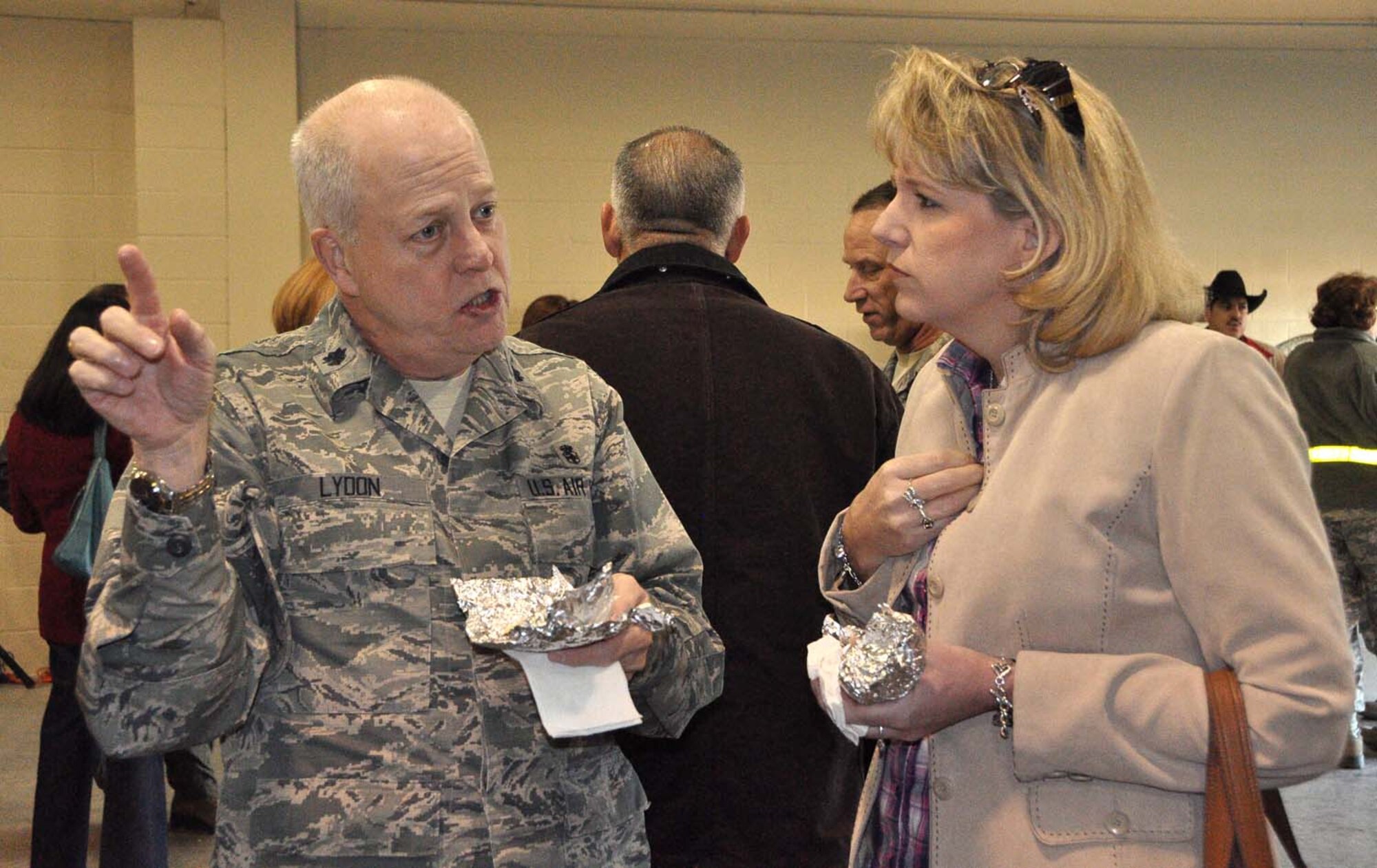 Lt. Col. William Lydon, 433rd Aerospace Medical Squadron, chats with the squadron’s honorary commander Denise Barkhurst, president and CEO of Big Brothers Big Sisters of San Antonio, at the 13th Annual Rodeo Round-Up Breakfast here Feb. 14. This is Barkhurst’s first rodeo breakfast and commented she loves attending these events. (U.S. Air Force photo by 1st Lt. Denise Haeussler)