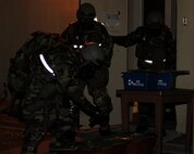 Staff Sgt. Ismael Tabual, left, and Tech. Sgt. Luis Navarro-Figueroa, 8th Comptroller Squadron, conduct an initial post-attack reconnaissance sweep during exercise Beverly Bulldog 13-2 at Kunsan Air Base, Republic of Korea, Feb. 14, 2013. PAR teams are used after an attack to check for casualties, unexploded ordnance, contamination from chemical, biological, radiological, nuclear or explosive weapons, and damage to structures and equipment. (U.S. Air Force photo by Senior Airman Marcus Morris/Released)