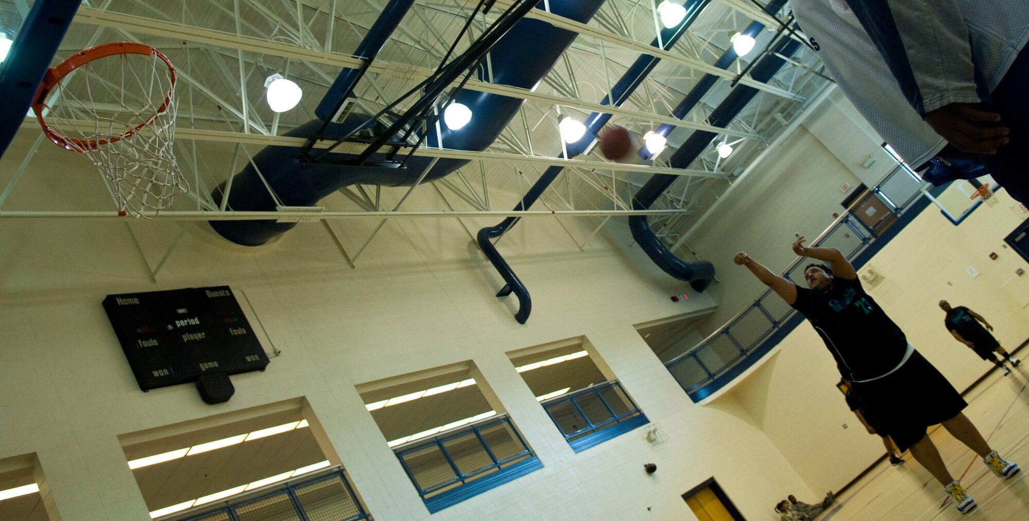 A Special Olympian fires a penalty shot Feb. 9 at Langley Air Force Base, Va., during the Special Olympics basketball tournament. Emphasis was placed on teamwork and encouragement during the tournament so every player could have the opportunity to enjoy themselves. (U.S. Air Force photo by Airman 1st Class Austin Harvill/Released)