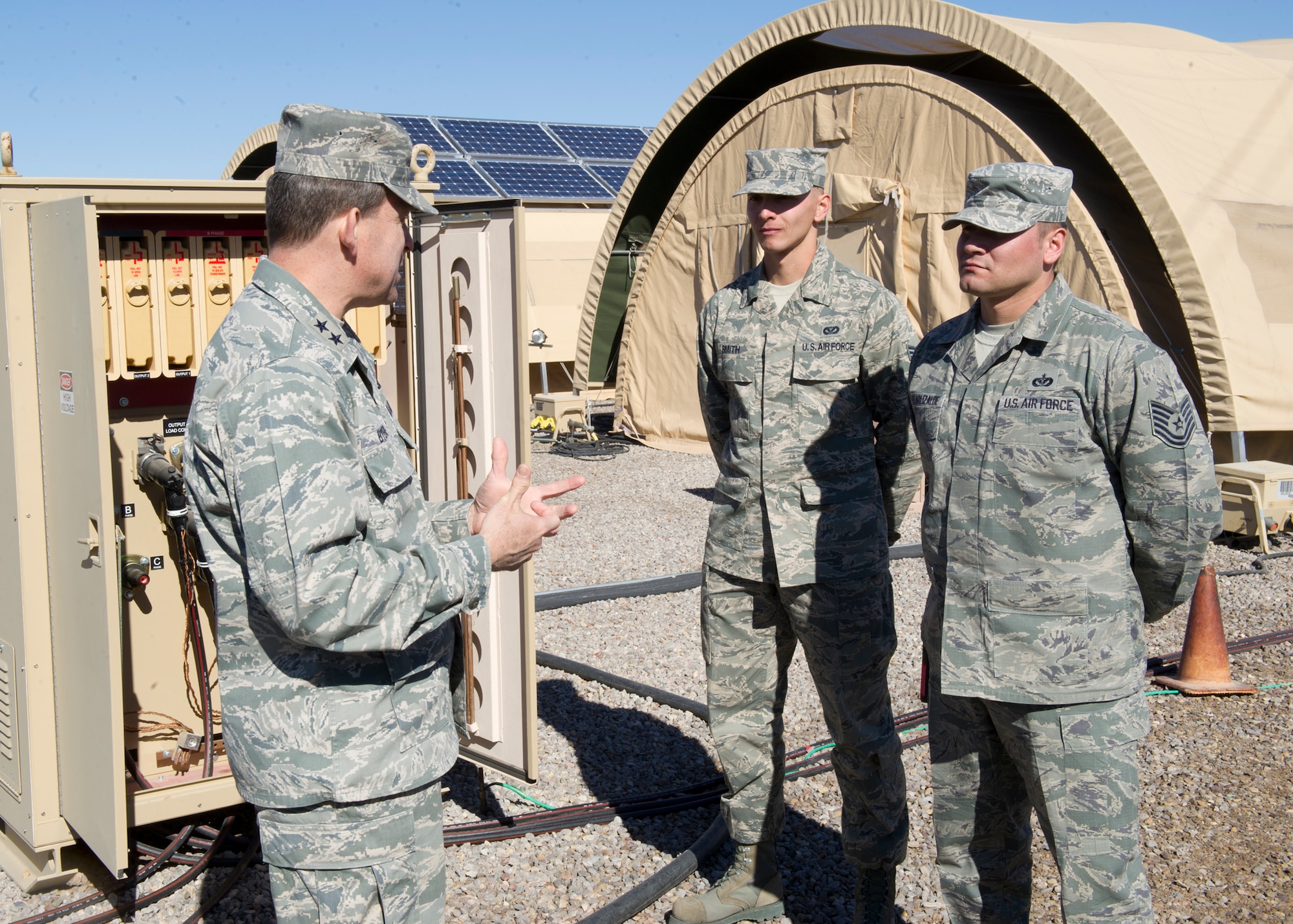 Major Gen. Timothy A. Byers, The Civil Engineer, Headquarters U.S. Air Force, Washington, D.C., is briefed by Technical Sgt. Manuel Avelarlizalde and Senior Airman Derick Smith, 49th Materiel Maintenance Squadron, while touring of Basic Expeditionary Airfield Resources (BEAR) Base “parade of homes” at Holloman Air Force Base, N.M., Feb. 13. Here at Holloman Byers was able to see firsthand the many aspects of the base’s mission. (U.S. Air Force photo by Senior Airman DeAndre Curtiss/Released) 