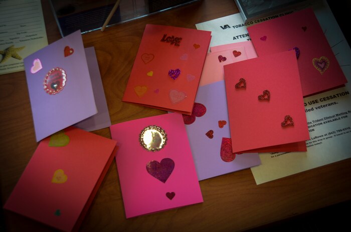 Volunteers from Joint Base Charleston visited VA clinics to give Valentine’s cards to veterans at the Ralph H. Johnson VA clinic, Naval Health Clinic Charleston hospital and Trident VA clinic, during National Salute a Veteran week, Feb. 13, 2012. 