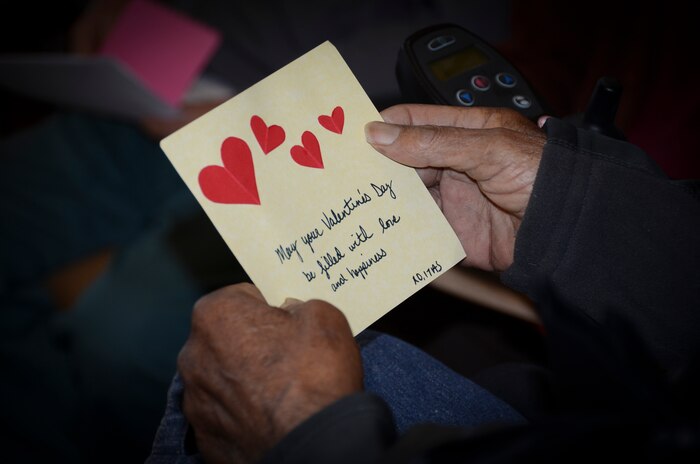 A veteran reads a Valentine’s card during National Salute a Veteran week Feb. 12, 2013, at the Veteran’s Clinic at Joint Base Charleston – Weapons Station. Volunteers from Joint Base Charleston also visited VA clinics to give Valentine’s cards to veterans at the Ralph H. Johnson VA clinic and Trident VA clinic. (U.S. Air Force photo/Staff Sgt. Anthony Hyatt)