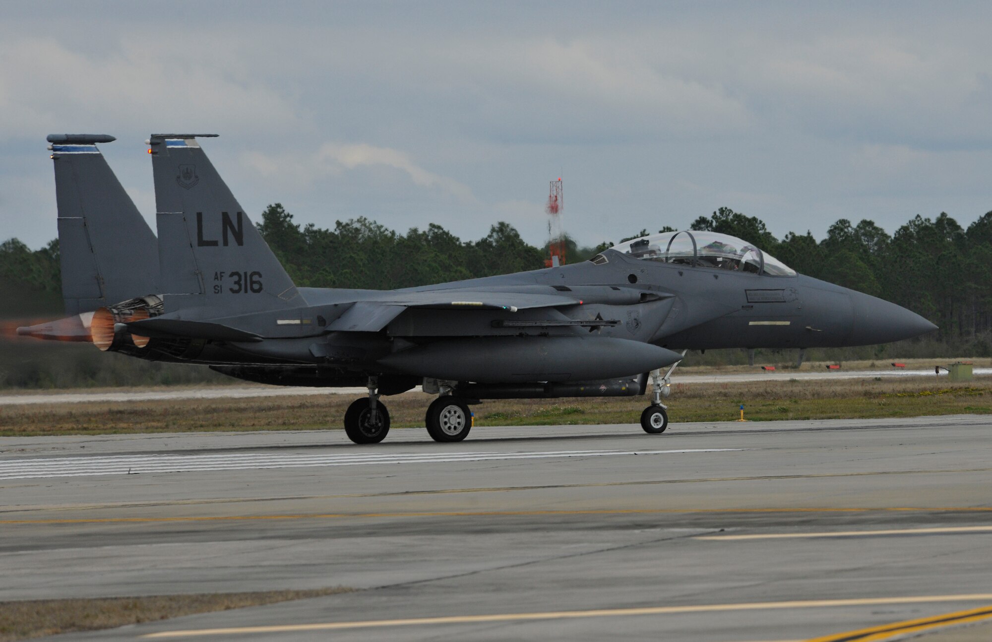 An F-15 Strike Eagle from Royal Air Force Lakenheath, England, taxis down the runway Feb. 6 during Combat Archer at Tyndall Air Force Base, Fla. The 53rd Weapons Evaluation Group recently conducted the air-to-air Weapons System Evaluation Program, known as Combat Archer, which exercises and evaluates the air-to-air weapon system capability of combat aircraft. (U.S. Air Force photo by Master Sgt. J. Scott Wilcox)