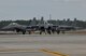 A group of F-15 Strike Eagles from Royal Air Force Lakenheath, England, taxi on the runway during Combat Archer Feb. 6 at Tyndall Air Force Base, Fla. The 53rd Weapons Evaluation Group recently conducted the air-to-air Weapons System Evaluation Program, known as Combat Archer, which exercises and evaluates the air-to-air weapon system capability of combat aircraft. (U.S. Air Force photo by Master Sgt. J. Scott Wilcox)