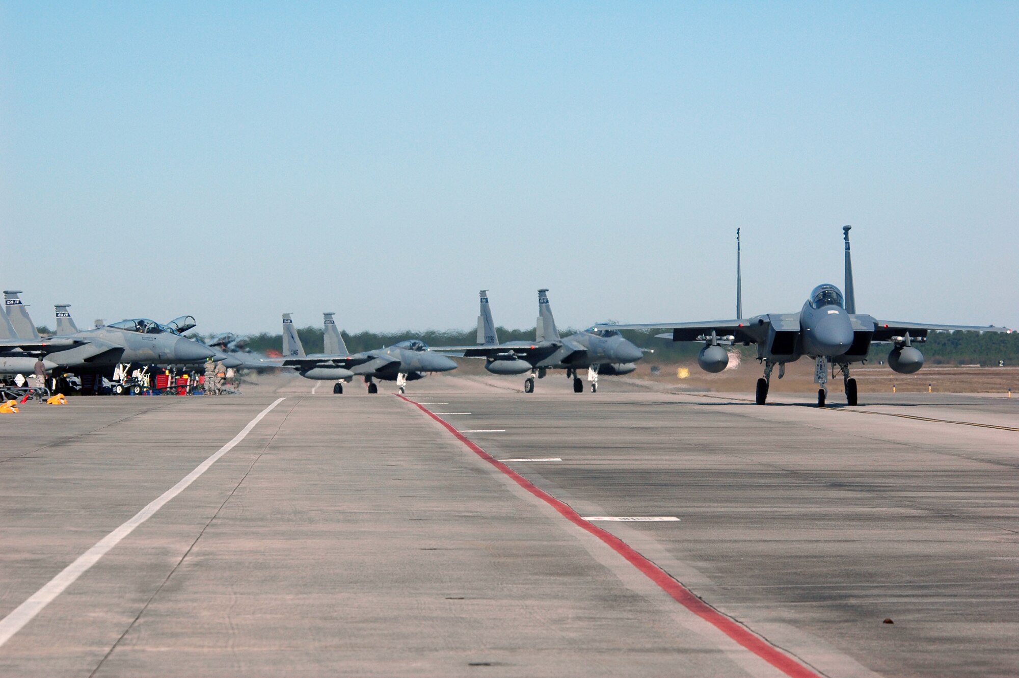 F-15C Eagles from the Florida Air National Guard taxi down the runway during Combat Archer Jan. 30 at Tyndall Air Force Base, Fla. The 53rd Weapons Evaluation Group recently conducted the air-to-air Weapons System Evaluation Program, known as Combat Archer, which exercises and evaluates the air-to-air weapon system capability of combat aircraft. (U.S. Air Force photo by Master Sgt. J. Scott Wilcox)