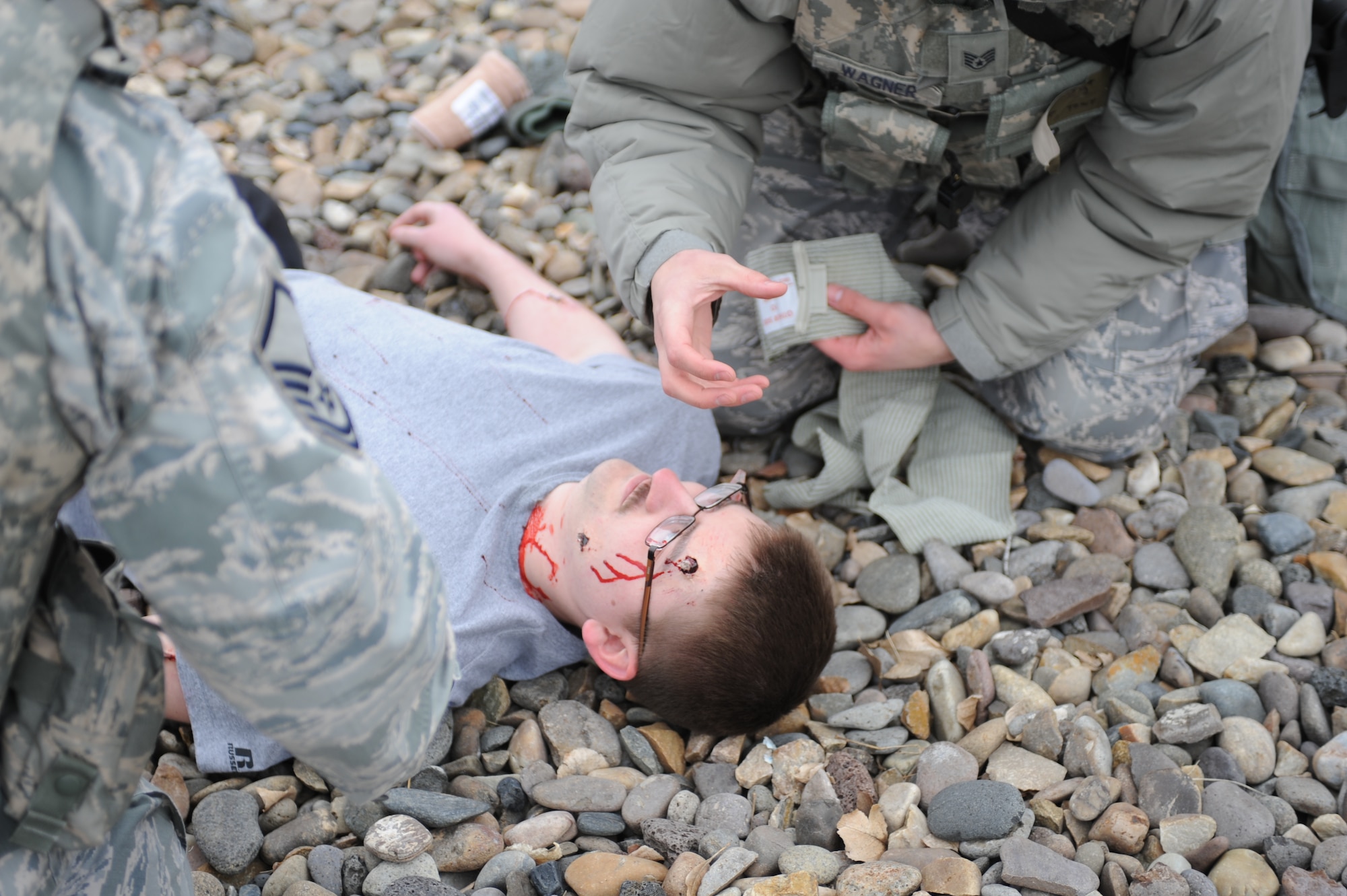 U.S. Air Force Airman 1st  Class Yevgen Pylypchenko, 366th Medical Group dental assistant, acts as a moulage victim to test the first aid care capabilities of Airmen Feb. 13, 2013, at Mountain Home Air Force Base, Idaho. Moulage victims are used by exercise evaluators to help test Airmen on basic combat lifesaver skills. (U.S. Air Force photo/Senior Airman Benjamin Sutton)   