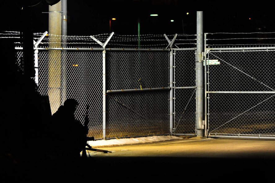 51st Logistics Readiness Squadron member guards the gate to the LRS area of operations during operational readiness exercise Beverly Bulldog 13-02 on Osan Air Base, Republic of Korea, Feb.13, 2013.  During OREs, Airmen highlight their ability to position, employ, and sustain forces and showcase operational readiness. BM 13-01 is the second ORE of the 2013.  (U.S. Air Force photo/Staff Sgt. Emerson Nuñez)