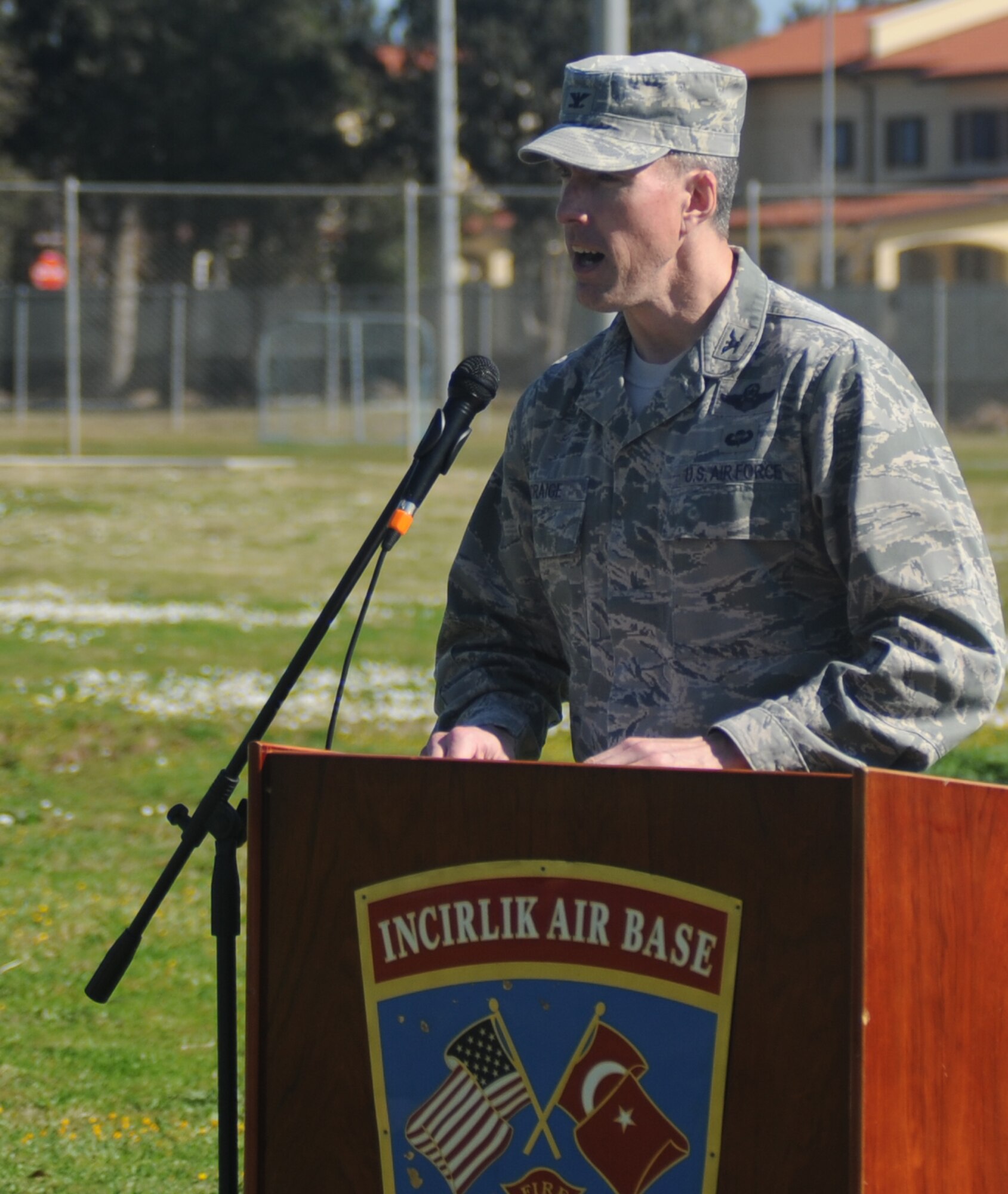 Col. Chris Craige, 39th Air Base Wing commander, addresses audience members during the ground breaking ceremony for the Consolidated Community Center Feb. 13, 2013 at Incirlik Air Base, Turkey. The Consolidated Community Center, set to open in the fall of 2014, will replace five structures on base providing a theater, library, game and activities room, conference room, multipurpose room, and reading and computer rooms. (U.S. Air Force photo by Staff Sgt. Eric Summers Jr./ Released)