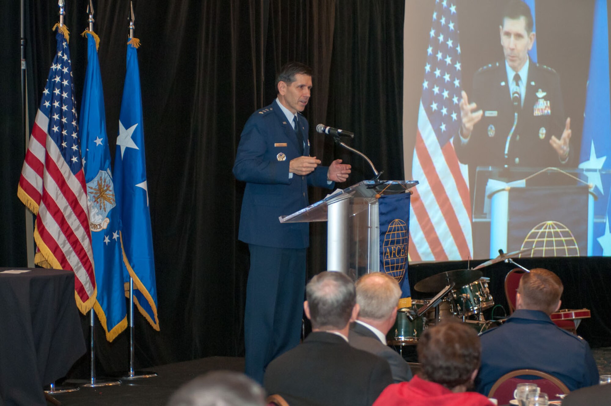 BURLINGTON, Mass. -- Lt. Gen. C.D. Moore II, Air Force Life Cycle Management Center commander, presents his "State of LCMC" briefing to a packed ballroom at the Marriott Hotel Feb. 12. Moore discussed the Center's transformation, including highlights of the past year. (U.S. Air Force photo by Rick Berry)