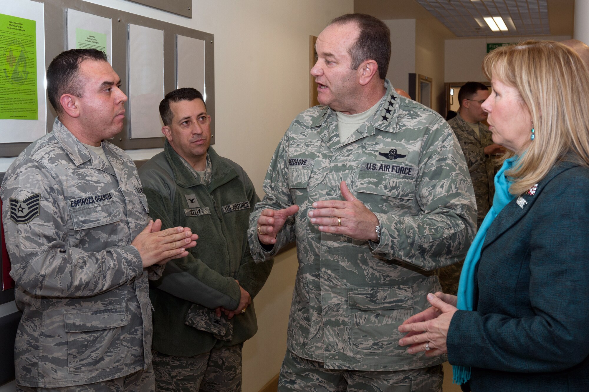 RAF ALCONBURY, United Kingdom – Gen. Philip M. Breedlove, U.S. Air Forces in Europe and Air Forces Africa commander, and his wife Cindy talk with Tech. Sgt. Jesus Espinoza Ogarcia, 423rd Medical Squadron mental health flight NCOIC, about how mental health helps keep Airmen in the fight during a tour of the RAF Alconbury Clinic Feb. 5. In less than 24 hours, the general and chief visited two of three air base groups in the 501st Combat Support Wing. (U.S. Air Force photo by Staff Sgt. Brian Stives)