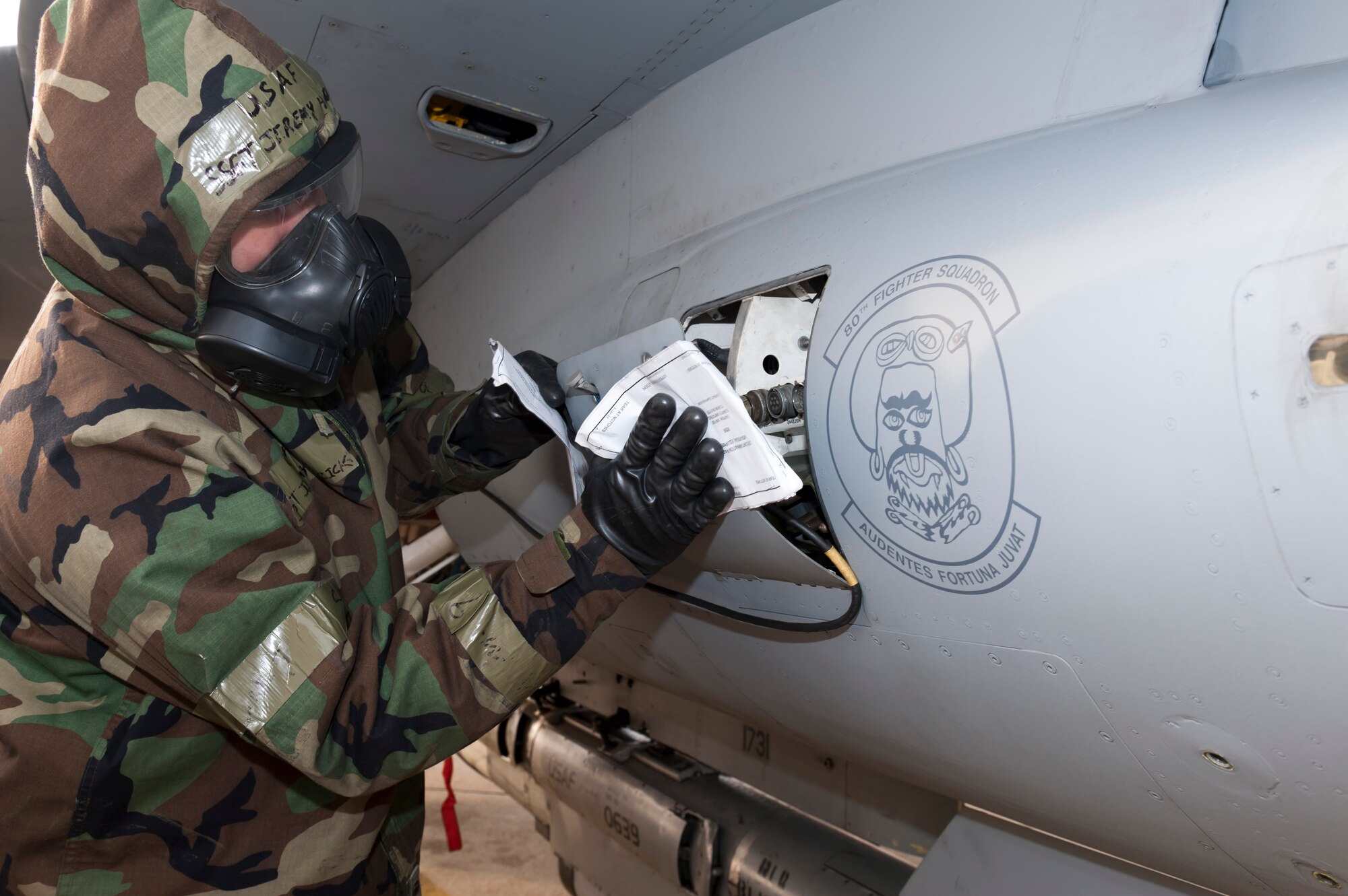 Tech. Sgt. Amos Potter, 8th Communications Squadron, is moulaged with an intestinal injury from a simulated aircraft incident during exercise Beverly Bulldog 13-2 at Kunsan Air Base, Republic of Korea, Feb. 14, 2013. Moulage made the scenarios look and feel more realistic to responders. (U.S. Air Force photo by Tech. Sgt. Michael Schocker/Released) 