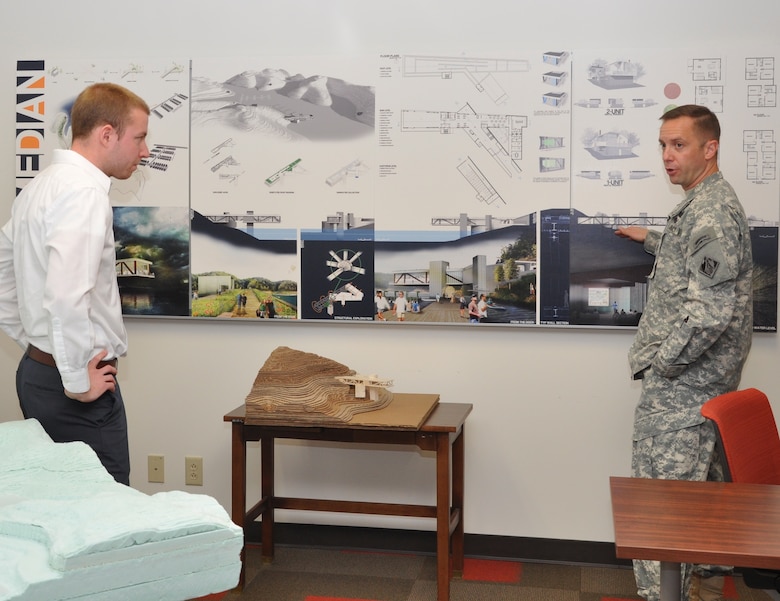 Lt. Col. James A. DeLapp, U.S. Army Corps of Engineers Nashville District commander, right, and Adam Clark discuss Clark’s architectural design for a proposed marina at Lake Cumberland, Ky., prepared and submitted as a class project by University of Miami-Ohio graduate students. Presentation was made Dec. 3, 2012 in the Nashville District office.