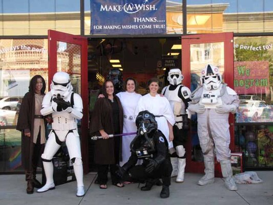 ERDC-CHL Deputy Director Jose Sanchez, second from left, poses with several of his partners in crime at a charity event benefiting the Make-A-Wish Foundation. 