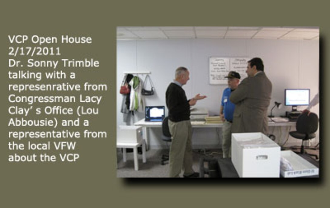 VCP Open House 2/17/2011.
Dr. Sonny Trimble talking with a representative from Congressman Lacy Clay's Office (Lou Abbousie) and a representative from the local VFW about the VCP