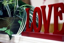 Decorations at the Carebridege Assisted Living center in Jacksonville, N.C., rest on a shelf during a Valentine’s Day celebration Feb. 12, 2013. The facility hosted a Sweetheart Dance and invited Marines from various units to dance, sing, eat and socialize with the residents. 