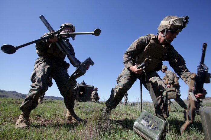 130213-M-OHO54-663
MARINE CORPS BASE CAMP PENDLETON, Calif. – Marines with Mortar Section, Weapons Platoon, Bravo Company, 1st Battalion, 4th Marine Regiment, 13th Marine Expeditionary Unit, move their M224A1 60 mm Mortar System to a new position during the culminating event of Exercise Iron Fist 2013, Feb. 13, 2013. During Exercise Iron Fist, the 13th MEU and members of Japan Ground Self Defense Force spent three weeks participating in bilateral training which improved their interoperability, enhanced military-to-military relations, and sharpened skills essential to crisis response.  (U.S. Marine Corps photo by Sgt. Christopher O’Quin/Released)
