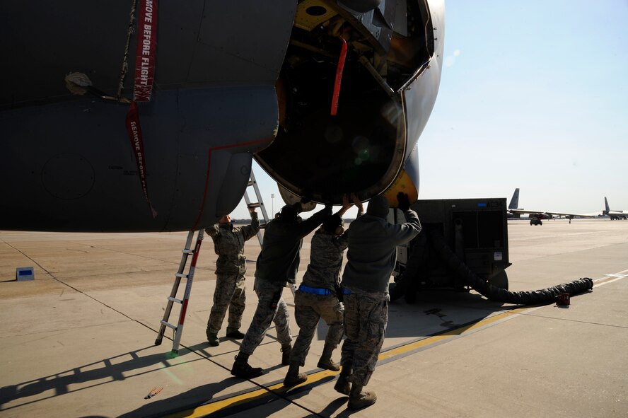 Airmen assigned to the 2nd Aircraft Maintenance Squadron lift the nose of a B-52H Stratofortress to access the radar on Barksdale Air Force Base, La., Feb. 15. The B-52s radar enables it to find and locate objectives for its mission of bringing precision munitions to the battlefield. (U.S. Air Force photo/Airman 1st Class Andrew Moua)