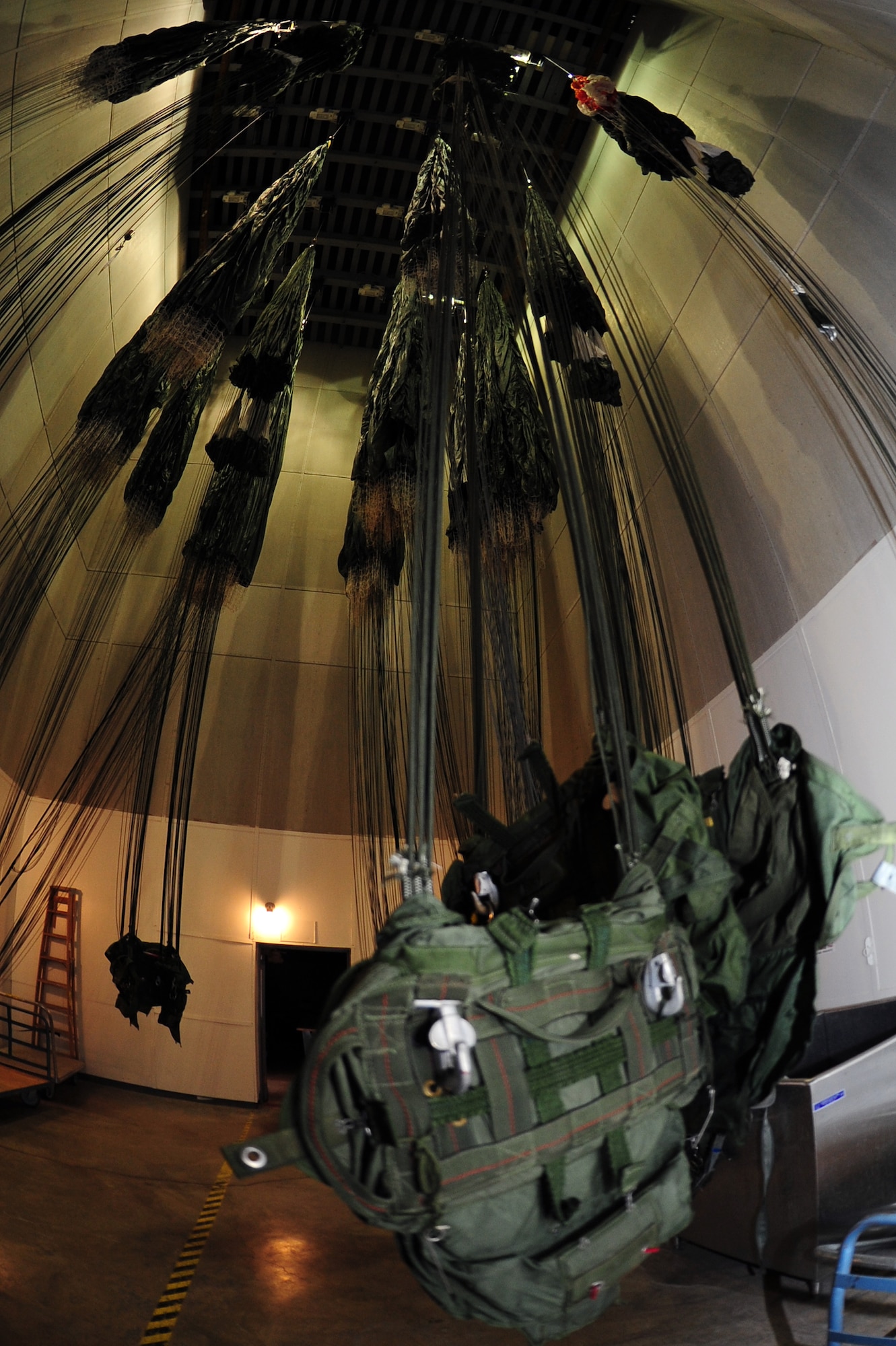 Parachutes used in water rescue training hang to dry in a tower at Davis-Monthan Air Force Base, Ariz., Feb. 13, 2013. Water rescue training is done at least twice a month. (U.S. Air Force photo by Airman 1st Class Camilla A Griffin/Released)