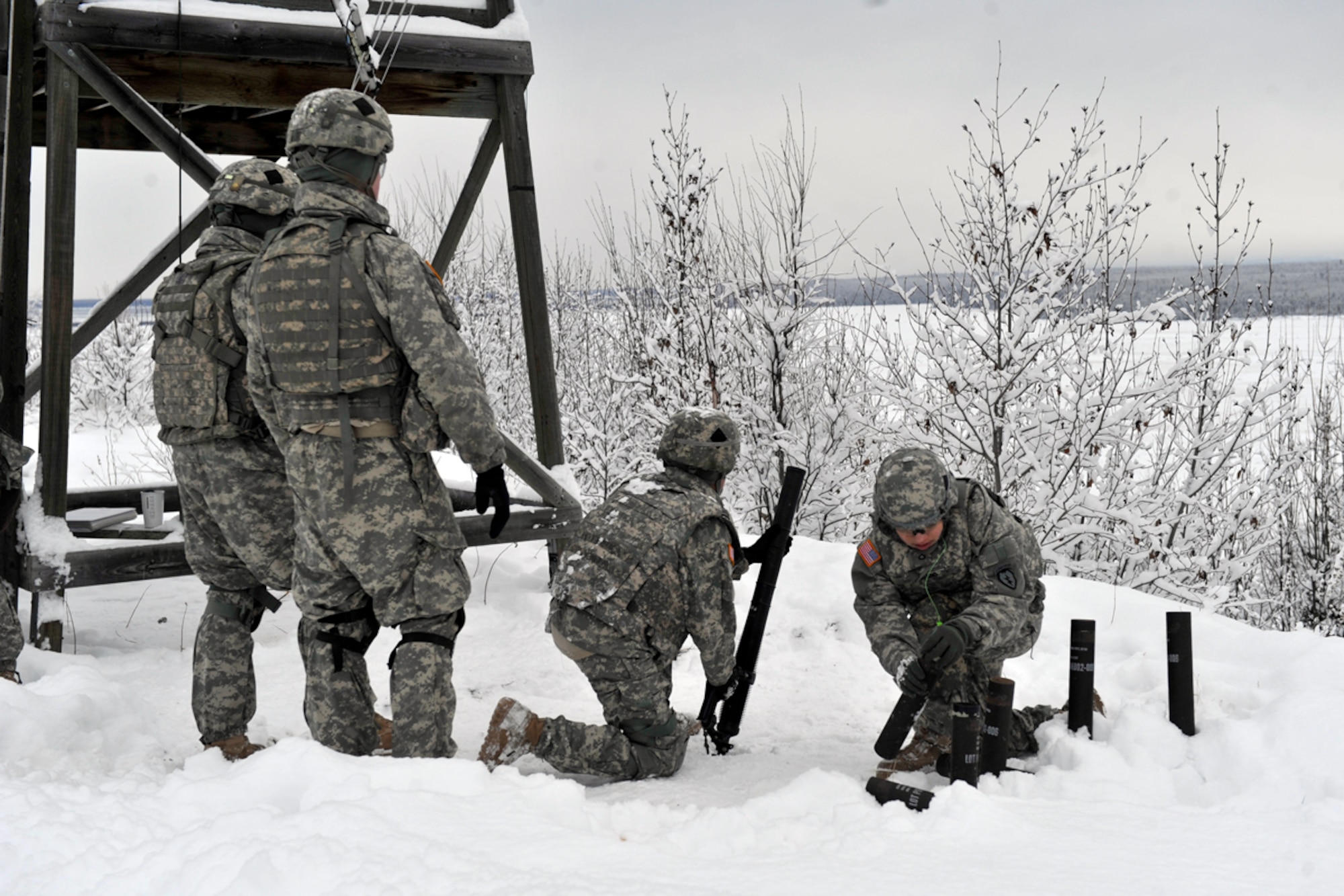 JOINT BASE ELMENDORF-RICHARDSON, Alaska -- Headquarters and Headquarters Company, 1st Battalion (Airborne), 501st Infantry Regiment mortarmen conduct mortar training using the 60-mm mortar system at the Upper Cole Range Feb. 7. Mortar training is an Army field requirement all infantry members must qualify for before being authorized to man them. (U.S. Air Force photo/Airman Ty-Rico Lea)