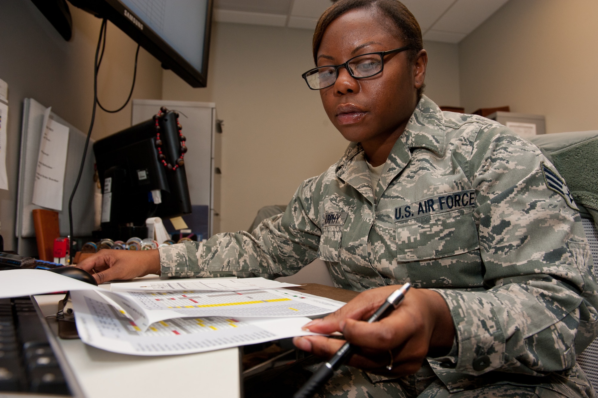 Senior Airman Alexandria Murphy, 432nd Attack Squadron aviation resource manager, reviews flight records in the 432nd ATKS SARM office on Ellsworth Air Force Base, S.D., Jan. 28, 2013. The SARM Airmen are responsible for keeping Ellsworth’s MQ-9 Reaper aircrews’ training records current to guarantee they are qualified to execute their mission. (U.S. Air Force photo by Airman 1st Class Kate Thornton-Maurer/Released)