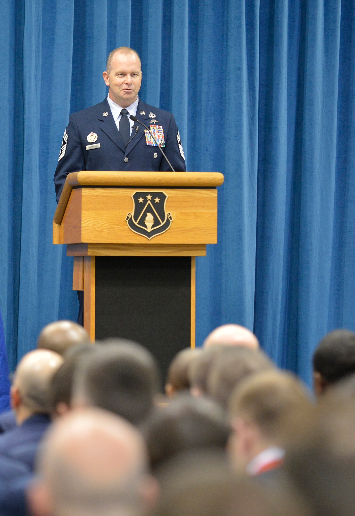 Chief Master Sgt. Jim Hotaling, Command Chief Master Sergeant of the Air National Guard, speaks to Airmen and Coast Guardsmen graduating from the Paul H. Lankford EPME Academy at the I. G. Brown Training and Education Center, here Feb. 14, 2013. Students attending the Noncommissioned Officers Academy and Airmen Leadership School totaled 314 for the six and five week classes. (National Guard photo by Master Sgt. Kurt Skoglund/Released)