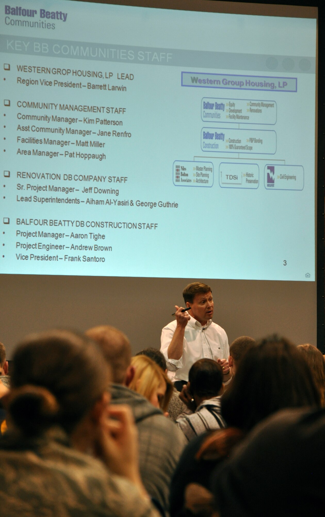 Members of the F. E. Warren community attend a town hall meeting in the Fall Hall Community Center Feb. 5 hosted by Balfour Beatty Communities. Barrett Larwin, Western Group Housing, LP regional vice-president, gave a presentation to those in attendance laying out the plans for future construction and improvements to take place on base within the next five years. (U.S. Air Force photo by Senior Airman Dan Gage)