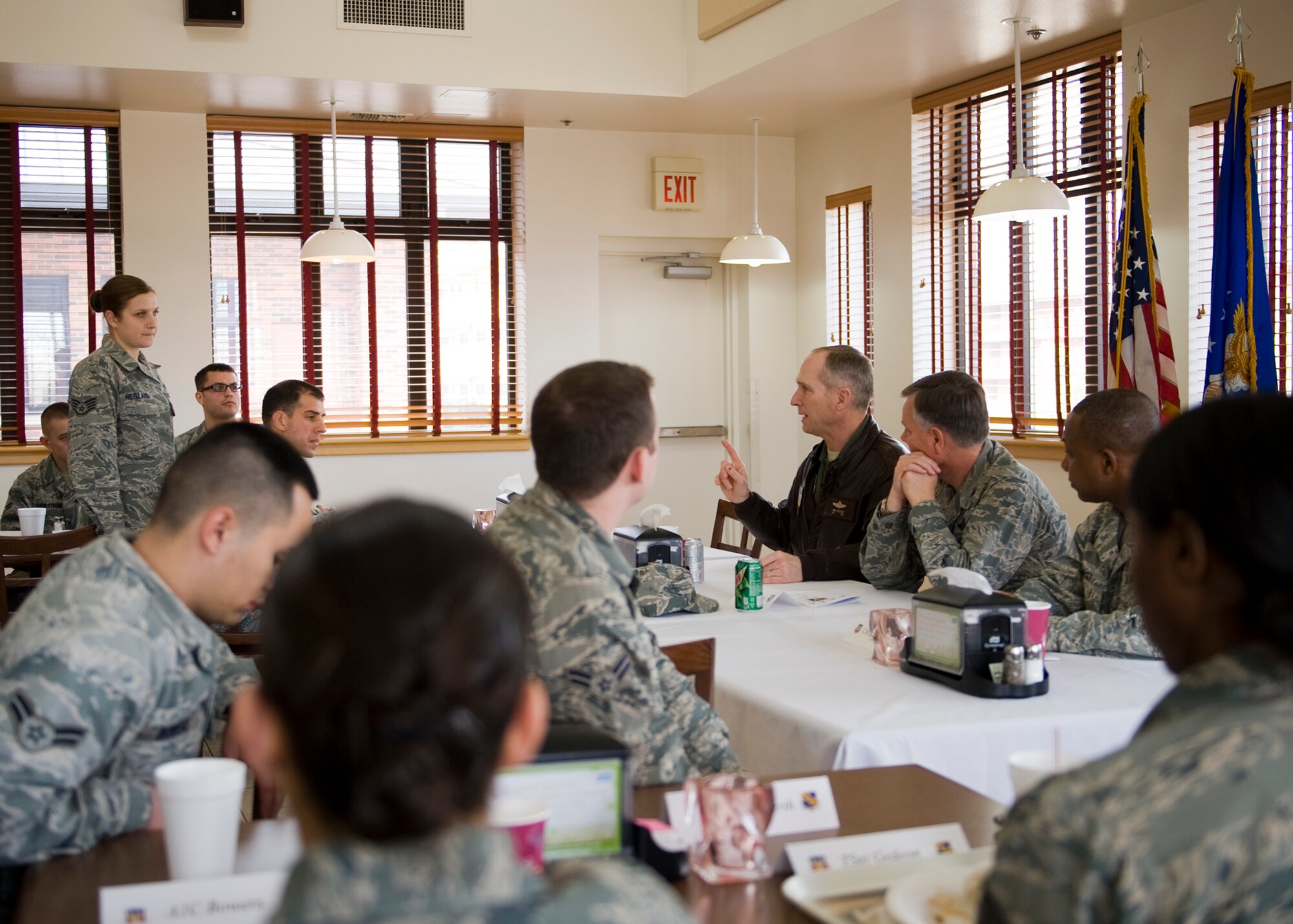 U.S. Air Force Gen. Mike Hostage, commander of Air Combat Command, addresses Airmen’s concerns during an immersion Feb. 12, 2013, at Dyess Air Force Base, Texas. While on his immersion, Hostage visited many base agencies and attended a luncheon with Dyess Airmen. During the luncheon, Hostage answered questions from Airmen, including questions about budget cuts, physical fitness standards and women in combat roles. (U.S. Air Force photo by Airman 1st Class Damon Kasberg/Released)