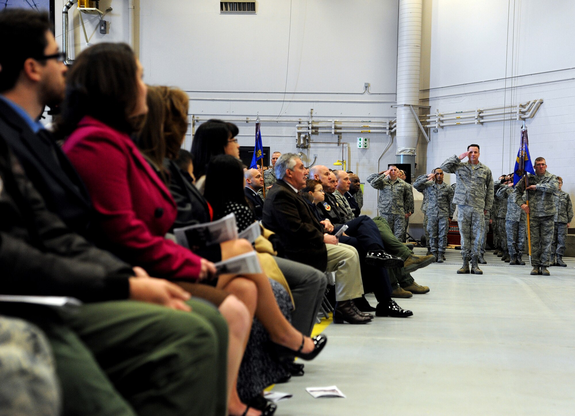 Team Malmstrom Airmen salute Col. Robert Stanley, newly appointed 341st Missile Wing commander, after he is officially presented command of the wing during a change of command ceremony Feb. 8 at the 3-Bay Hangar. Stanley became the 35th commander in the wing’s history, succeeding Col. H.B. Brual. (U.S. Air Force photo/Staff Sgt. R.J. Biermann)