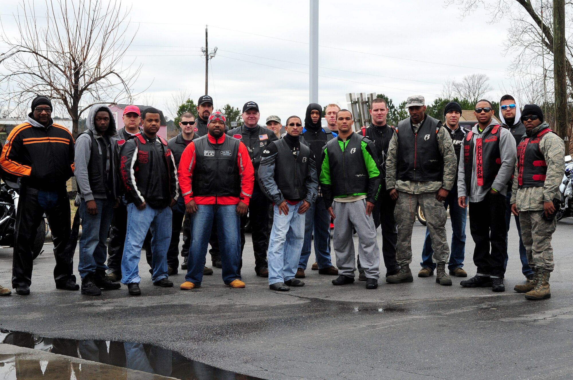 A group of motorcycle riders pose prior to a charity ride around Wayne County, N.C., Feb. 8, 2013. The charity ride raised nearly $800 for a Seymour Johnson Air Force Base family after a house fire several weeks ago. (U.S. Air Force photo/Airman 1st Class Mariah Tolbert/Released)